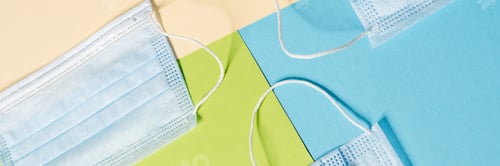 Preview: The close-up of the three clean disposable masks lying in the studio