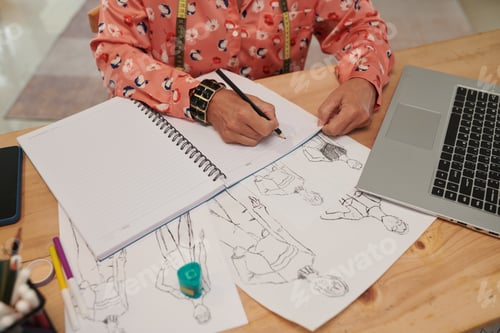 Preview: Fashion Designer Planning Work