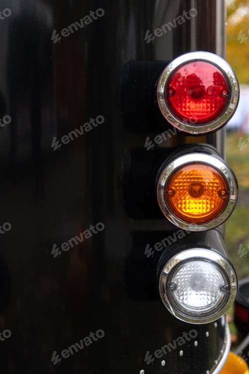 Preview: Closeup of black old retro car backlight, copy space