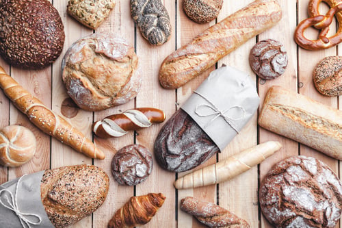 Preview: Delicious fresh bread on wooden background