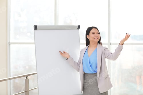 Preview: Professional Woman Giving a Presentation in an Office
