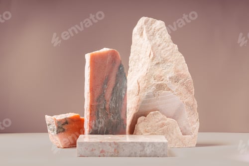 Preview: Piece of granite stone against beige background with shadows