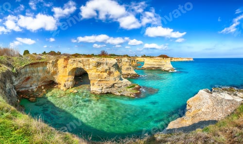 Preview: Picturesque seascape with cliffs, rocky arch at Torre Sant Andrea