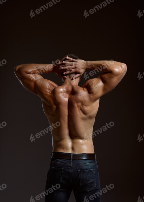Preview: Male athlete with muscular body, back view