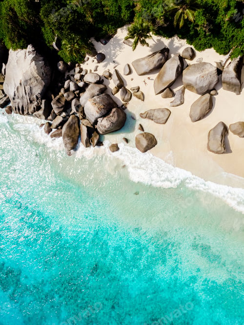 Preview: Drone view from above at a tropical beach in the Seychelles Mahe