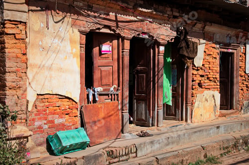 Preview: Ruined house with old wooden doors