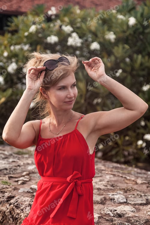 Preview: Middle age woman outdoors