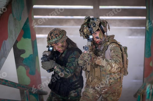 Preview: Two of woman soldiers hold gun and walk through step and go up to top of defensive base