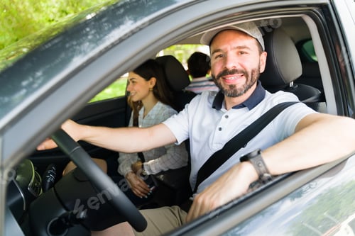 Preview: Cheerful husband enjoying a little road trip