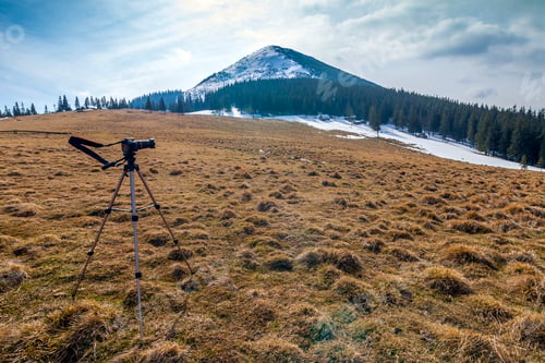 Preview: In mountains camera on a tripod in cold weather