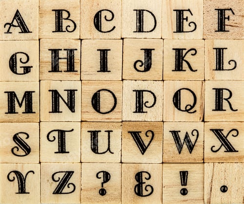 Preview: English alphabet uppercase, background of isolated wood letterpr