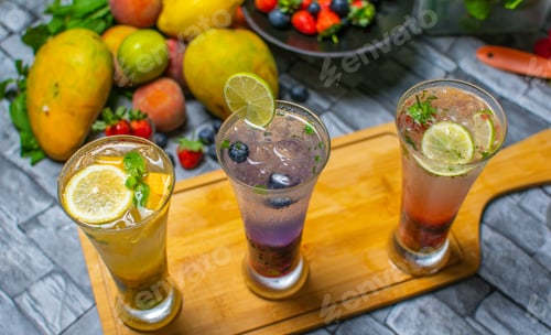 Preview: Strawberry, blueberry, mango Mojito cocktails