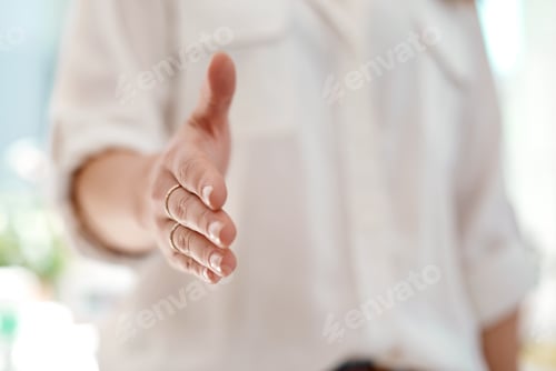 Preview: Cropped shot of an unrecognizable businesswoman reaching out for a handshake inside her office