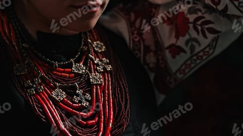 Preview: Demonstrating traditional antique jewelry necklace. National costume of Ukraine. Ukrainian woman