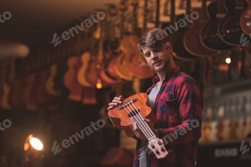 Preview: Young musician with an ukulele