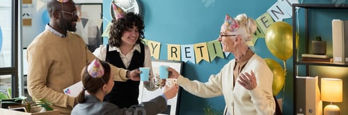 Preview: Senior Caucasian Woman Toasting with Colleagues