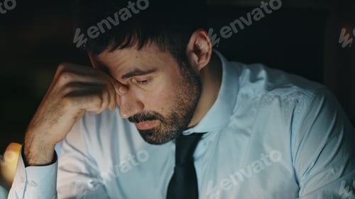 Preview: Overloaded ceo feeling headache sitting office late evening closeup. Man burnout