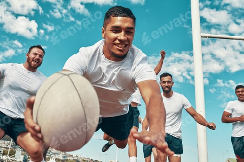 Preview: Hes the man of the match. Shot of a rugby player scoring a try while playing on a field.