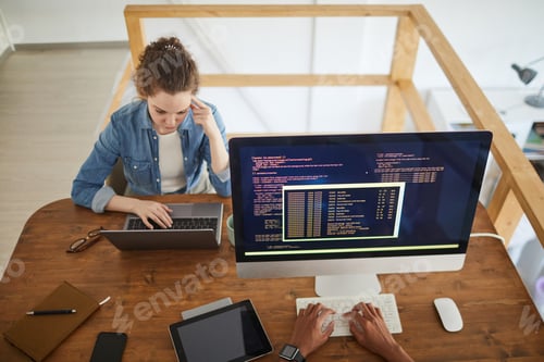 Preview: Two Young People Working in IT Development Studio