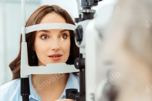 Preview: Pretty woman check-up her eyesight in ophthalmological clinic