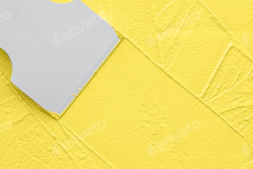Preview: Applying yellow putty with spatula, interior redecorating finishing works