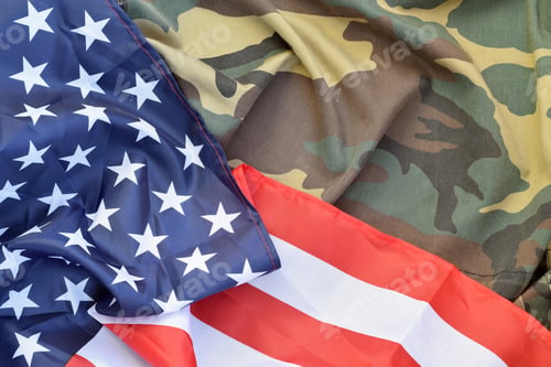 Preview: United States of America flag and folded military uniform jacket. Military symbols conceptual