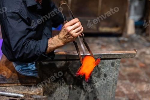 Preview: Glass blower at work in workshop in Murano, Italy