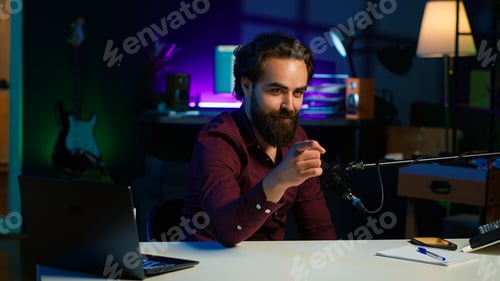 Preview: Childish man doing creative intro for vlog spinning on chair while filming