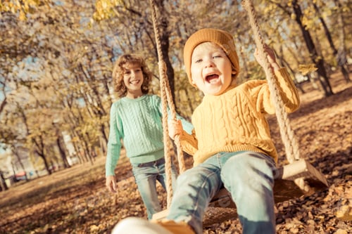 Preview: Happy children having fun outdoor in autumn park