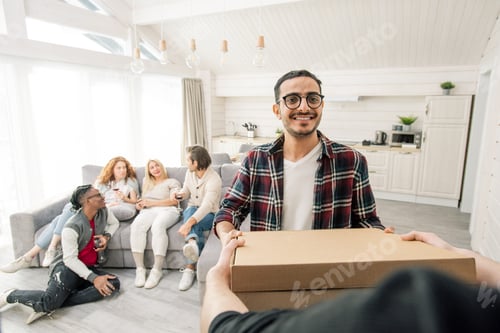 Preview: Young Man Getting Pizza Delivered
