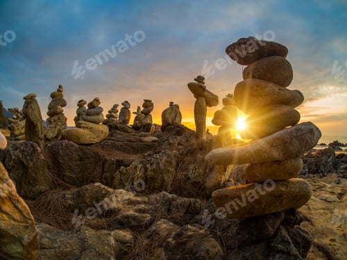 Preview: Stones pyramid on sand symbolizing zen, harmony, balance in Khao Lak Thailand