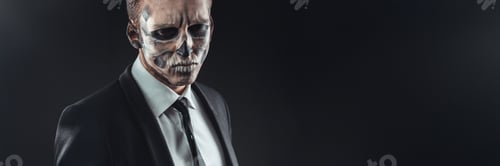 Preview: Man in Suit with Skull Makeup Wide Banner