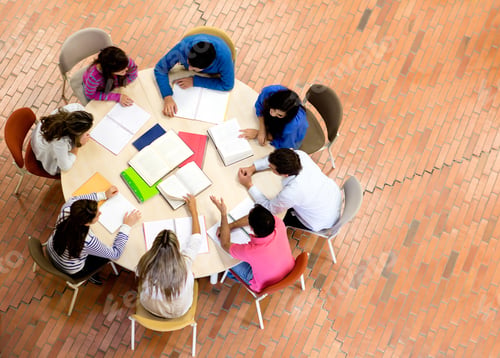 Preview: Study Group With Young People Sitting In A Round Table