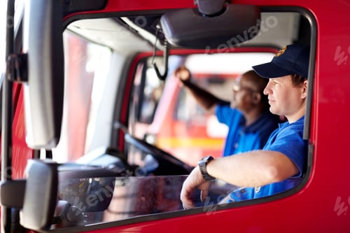 Preview: Waiting on the next call. Shot of firemen sitting in a truck.