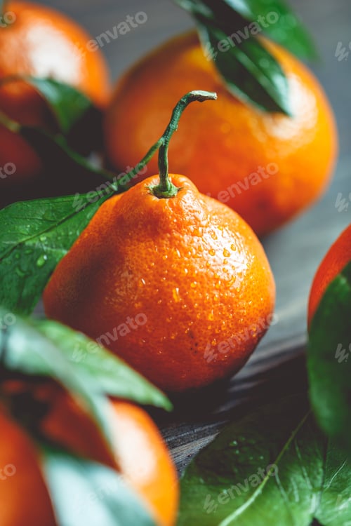 Preview: Tasty tangerines on a table. Macro food photography. The concept of healthy eating and lifestyle.