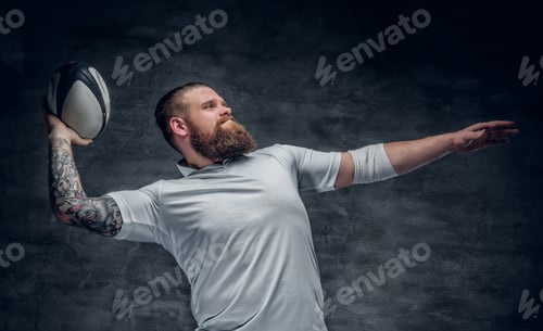 Preview: Brutal bearded rugby player in action.