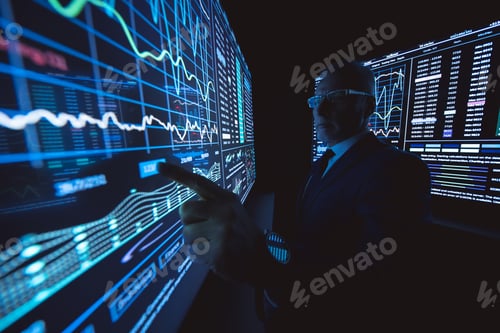 Preview: The man working on the big sensor display in the dark lab