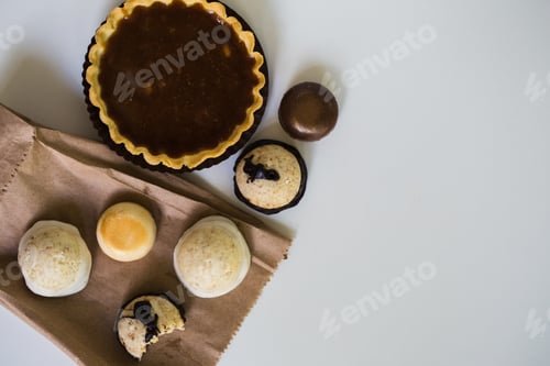 Preview: Delicious Desserts Displayed on a Brown Paper Bag