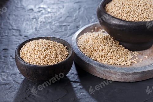 Preview: Quinoa Grain in Rustic Bowls on Dark Surface