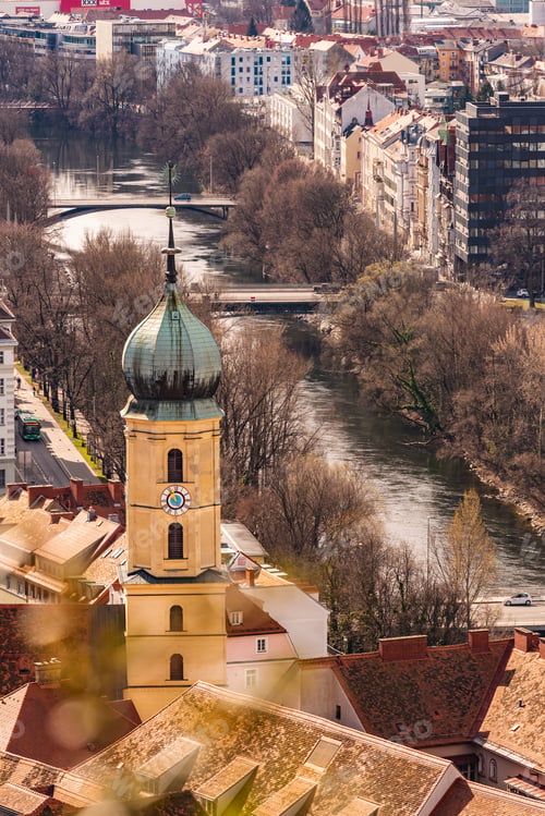 Preview: View at Graz city with his famous buildings. River mur. Vertical photo