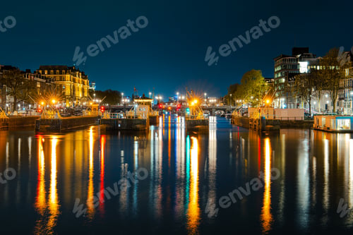 Preview: Illuminated Canals and Riverside Delights: Exploring Amsterdam After Dark