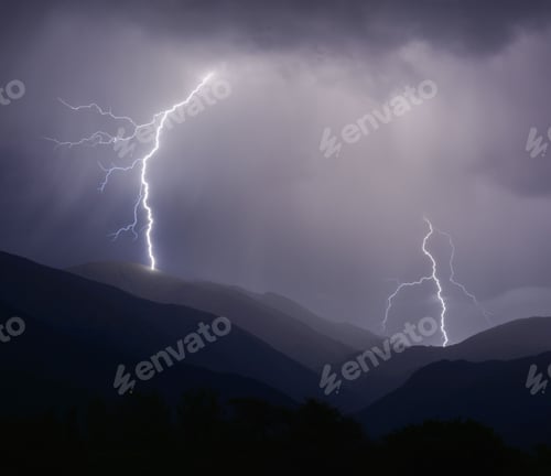Preview: Violent, stormy night in the mountains with flashes of lightning striking the peaks