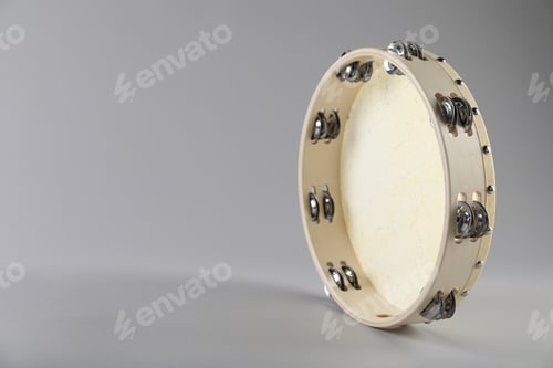 Preview: Tambourine on light background. Space for text