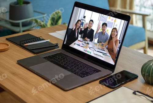 Preview: close up screen groupd of asian colleage video confernece business plan with laptop on table at home