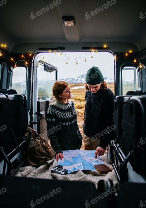Preview: Couple making a wanderlust vacation, exploring iceland with their 4x4 jeep