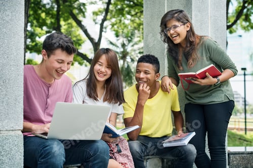 Preview: Young Diverse Group Studying Outdoors Concept