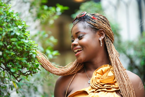 Preview: Portrait of attractive black skin young woman, Charming Afro girl. Portrait of afro girl looking at