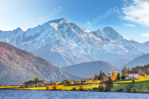 Preview: Fabulous autumn view of Haidersee (Lago della Muta) lake with Ortler peak on background.