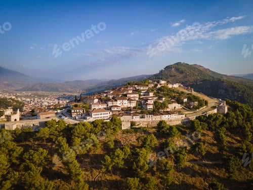 Preview: Aerial view of the old Castle in Berat and its ancient neighborhoods in sunset light