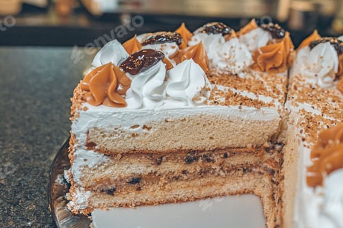 Preview: Delicious Caramel Cake with White Whipped Cream